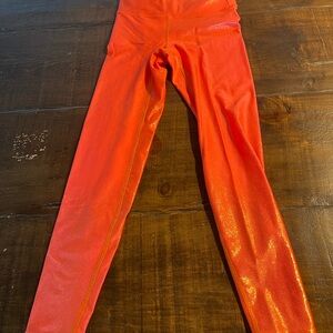 Heroine Sport Shimmering Orange Leggings